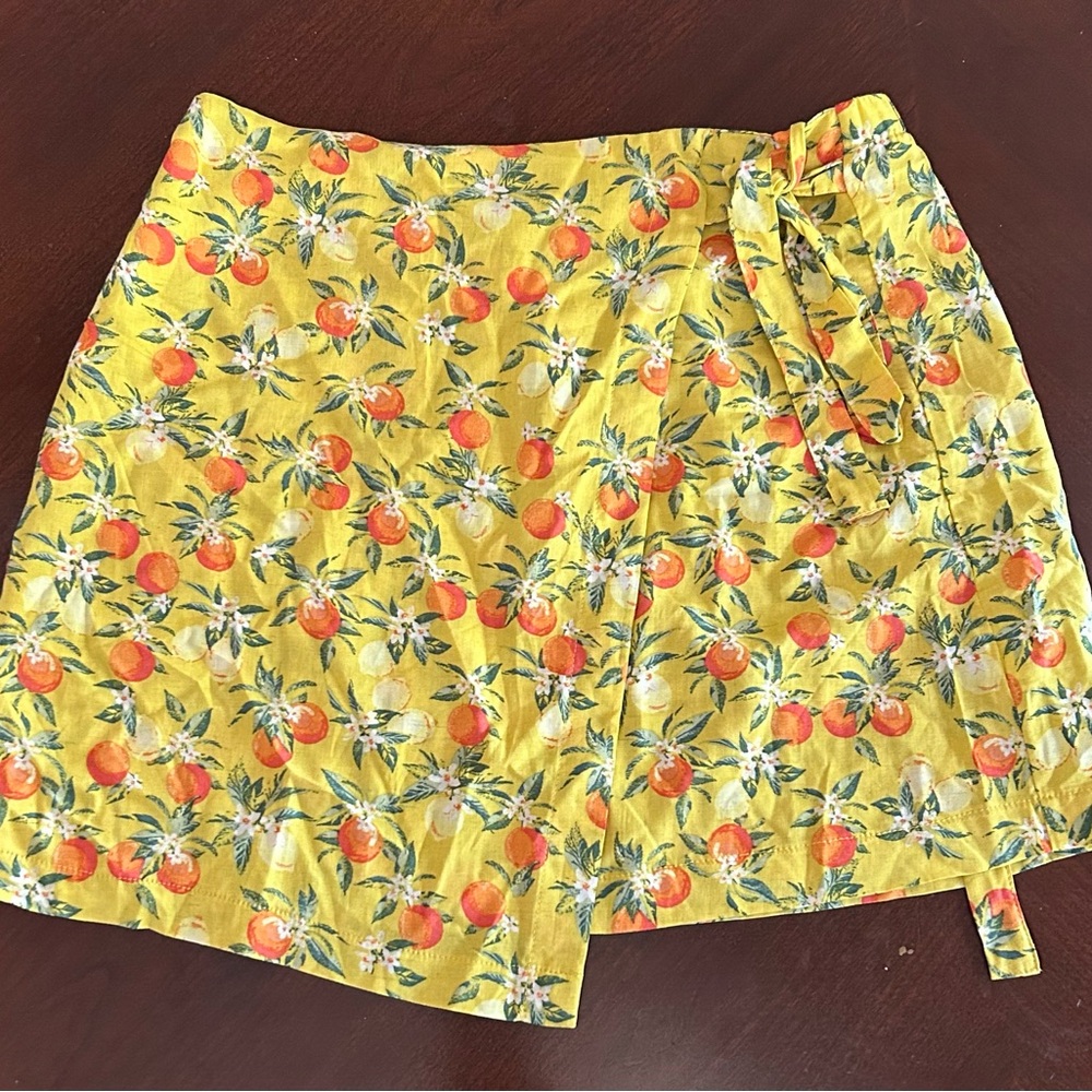 Yellow asymmetrical mini skirt